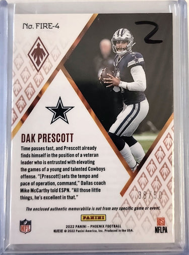 2022 Panini Phoenix #FIRE-4 Dak Prescott Fire Fabrics Purple #/50