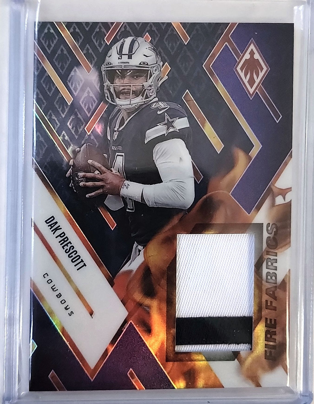 2022 Panini Phoenix #FIRE-4 Dak Prescott Fire Fabrics Purple #/50