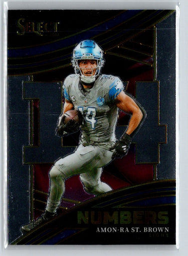 2023 Panini Select #NMB-AST Amon-Ra St. Brown Numbers M44
